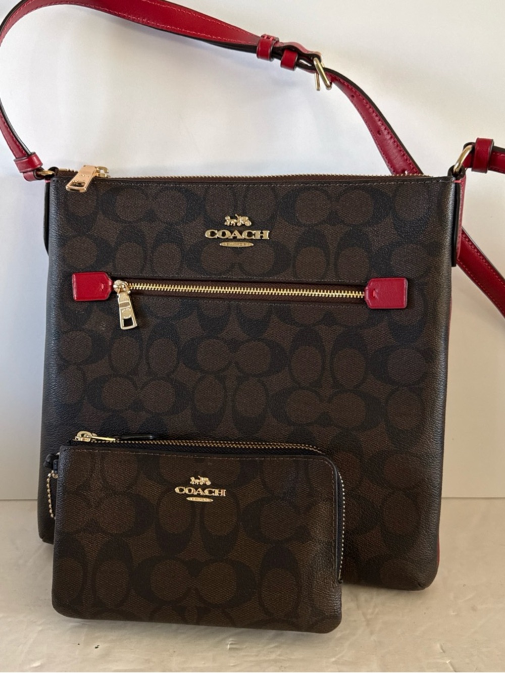 COACH Signature Rowan Crossbody Bag with Red Trim and matching Wristlet wallet.